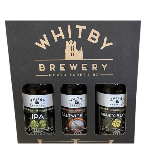 Whitby Hampers gift pack featuring three Whitby Brewery craft beers including IPA, Saltwick Nab, and Abbey Blonde.