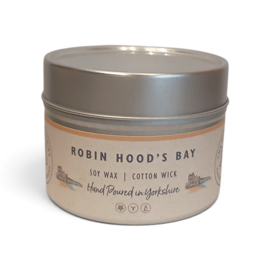 Whitby Hampers Robin Hood's Bay hand-poured soy wax candle in a minimalist silver tin with a cotton wick.