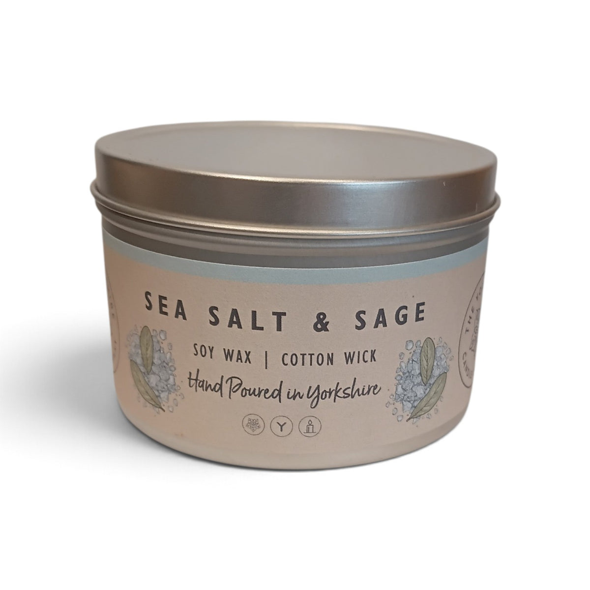 Whitby Hampers Sea Salt and Sage soy wax candle in a reusable metal tin with a natural cotton wick.