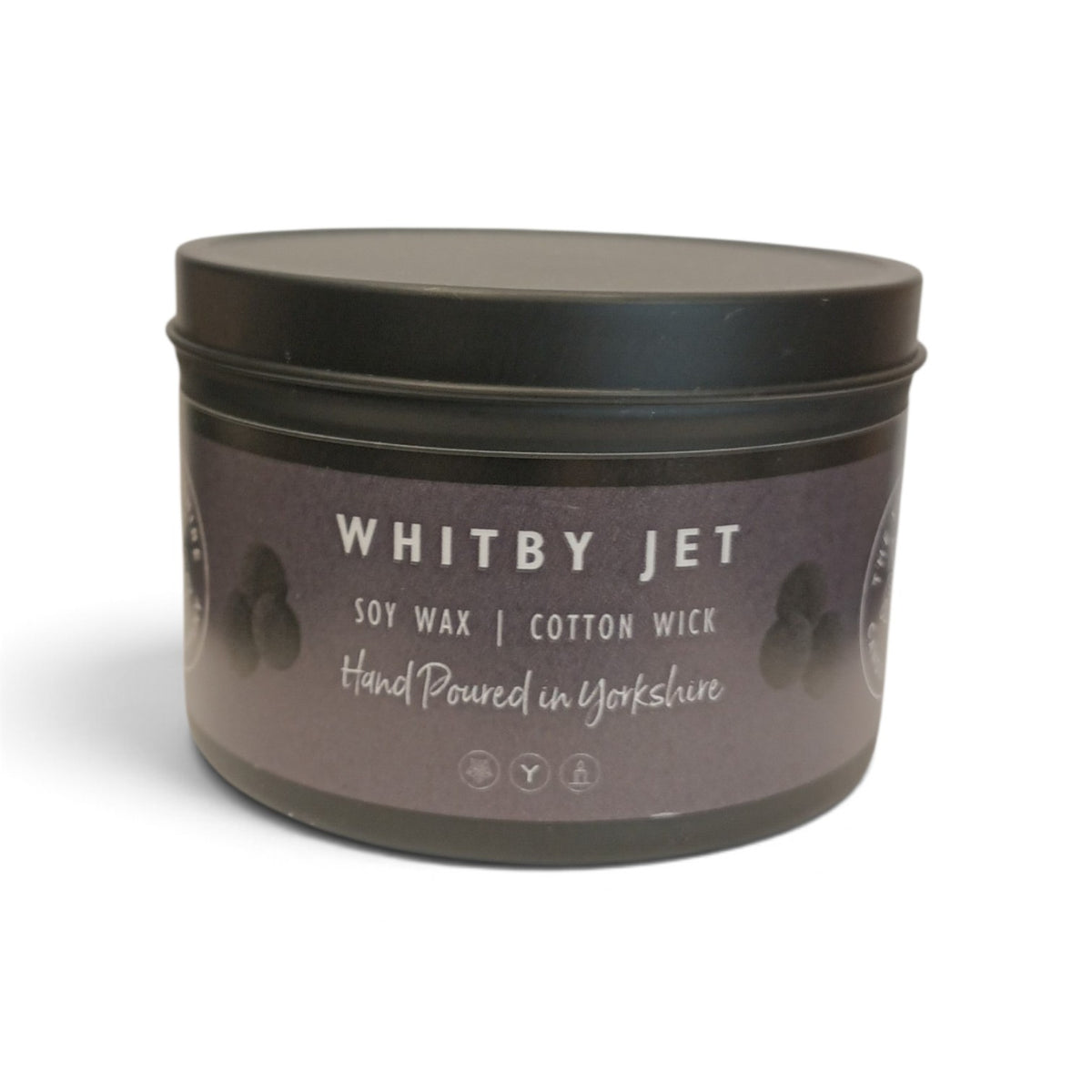 Whitby Hampers hand-poured soy wax candle in a sleek black tin with a minimalist Whitby Jet label.